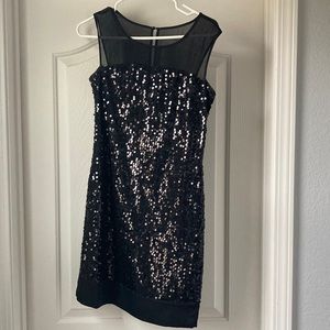 Black sequin midi dress.